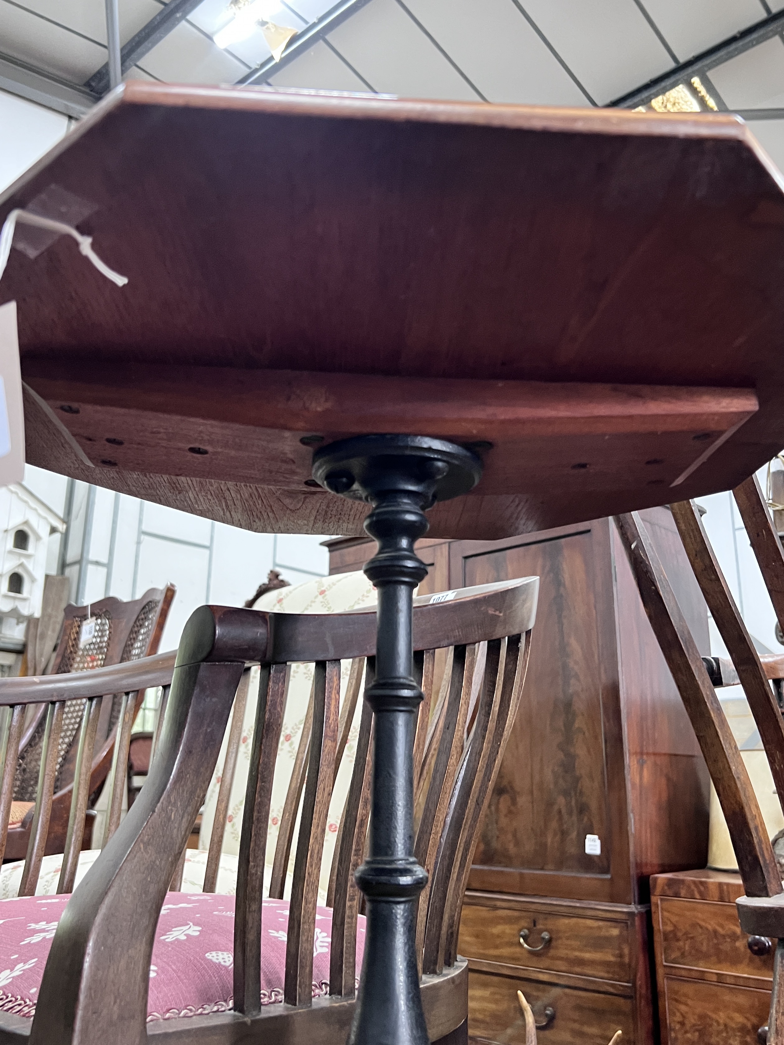 A Victorian and later mahogany and cast iron octagonal top tripod table, width 50cm, height 74cm